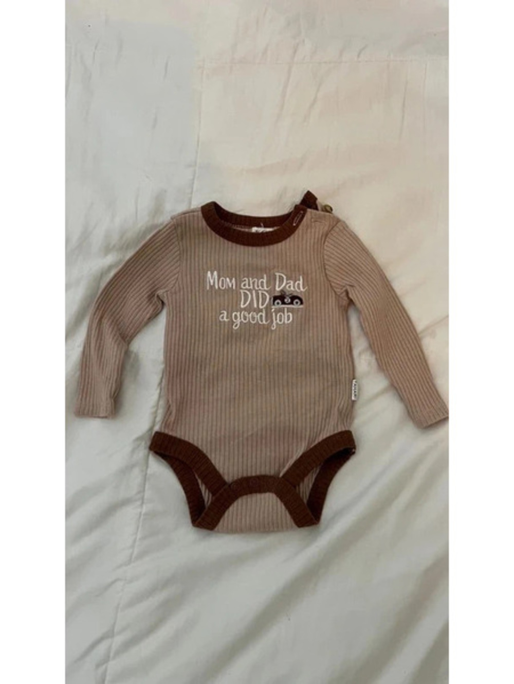 Beige baby onesie